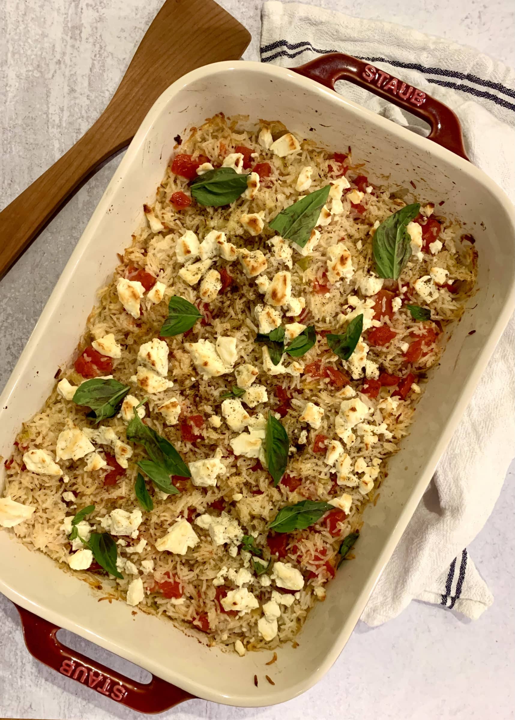 Baked rice with tomatoes and feta
